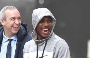 Igahlo in high spirits as he steps out of the Lowry Hotel in Manchester…