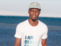 Abu Azeez turns model, models beach soccer shirt