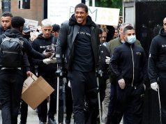 Anthony Joshua hobbles on crutches as he joins Black Lives Matter protest in Watford