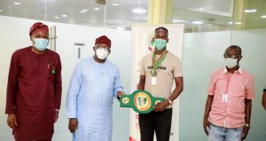 Ekiti State Governor, Dr. Kayode Fayemi Receives National Light Heavyweight Champion, Adewale Masebinu in bid Of World Title Support