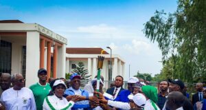 NSF 2022 : Dare Arrives Asaba, Joins Okowa To Receive Torch Of Unity