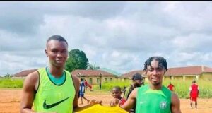 Divine Nwachukwu Making The Most Of The Holidays As He’s Pictured Gifting Jerseys To Grassroots Team Back In His Hometown