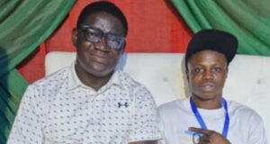 PHOTO: Newly Crowned Champion, Omole Dolapo Flanked By The DG LSSC, Gafaar