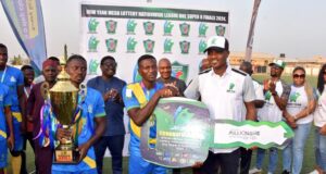 Police Baretta Gets ₦30m 18-seater Bus For Winning New Year Mega Lottery/NLO Super 8