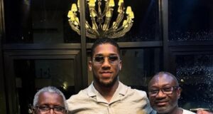 “AJ Will Invest Wisely”: Nigerians React as Anthony Joshua Poses with Aliko Dangote and Femi Otedola
