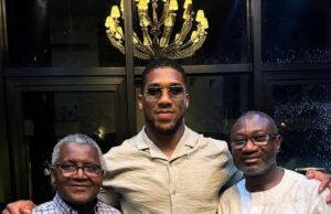 “AJ Will Invest Wisely”: Nigerians React as Anthony Joshua Poses with Aliko Dangote and Femi Otedola