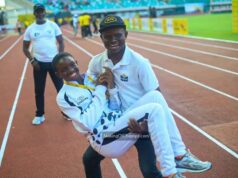 Unbreakable Bond: Felix Onoriode Lifts Daughter Bernice After Her U17 100m Victory at MTN Champs Grand Final