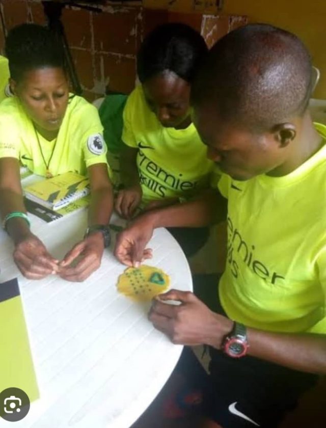 Premier Skills instructor, Jamiu Isa (right)