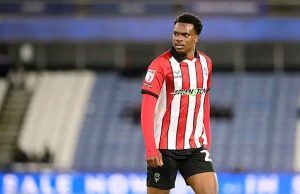 Deji Elerewe Part of Historic Lincoln City Promotion After 65 Years