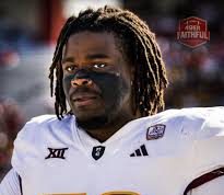 Max Iheanachor Relishes Becoming No. 21 Pick By Pittsburgh Steelers In 2026 NFL Draft ………………………… University of Arizona State’s outgoing offensive tackle, Maxwell Iheanachor (aka Max) is relishing his emergence as number 21 pick by Pittsburgh Steelers in this year’s United State’s National Football League (NFL) draft. Sports247 reports that Iheanachor, who played student games for East Los Angeles College and Arizona State Sun Devils in USA’s National Collegiate Athletics Association (NCAA), said he is happy with his emergence as a first round NFL draft pick. Although he started playing American Football only after he joined East Los Angeles College, The Steelers’ newest addition to their NFL roster said he’s eager and determined to give his very best. A report by Gerry Dulac of Pittsburgh Post-Gazette revealed, “The Steelers on Thursday used their top pick in the 2026 NFL draft on Arizona State offensive tackle Max Iheanachor, a move that indicates concerns about Broderick Jones. “Iheanachor, listed at 6 feet 6 and 321 pounds, started 26 games at right tackle the past two seasons at Arizona State and was a second-team All-Big 12 Conference selection. At pick No. 21, he was the sixth tackle selected in the first round.” An additional report by Ashish Mathur revealed that Iheanachor, who was also the first pick of The Steelers’ new era under Mike McCarthy, was drafted by Pittsburg because of Broderick Jones’ neck injury. Iheanachor was an All-Big 12 Second Team selection in 2025, but NFL analyst, Brent Sobleski of Bleacher Report gave his new team a “C” for their pick, adding: “The Pittsburgh Steelers felt almost forced into a corner with this selection after learning that left tackle, Broderick Jones suffered a setback with last season’s neck injury. “Even a healthy version of Jones could have been replaced after a disappointing performance over the last two seasons. He likely won’t be replaced by Max Iheanachor, who is a natural right tackle and still learning the game.” Iheanachor, who did not allow a single sack in last season’s college football games for Arizona State, across 484 pass-blocking snaps, said he had a meeting with The Steelers at the NFL Combine and a Zoom call with them afterwards. The 22-year-old Nigerian-born rising star, who played soccer and basketball up till high school level, also admitted he didn’t know that he would end up in Pittsburgh, but said he is happy he did. Sports247 gathered further that Iheanachor was born in Nigeria but moved to USA with his parents when he was 13 years old, following which he became a soccer student at King Drew Magnet High School, then switched to American Football in college.