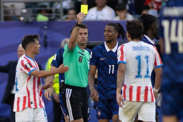 Michael Olise receives yellow card while playing against Paraguay