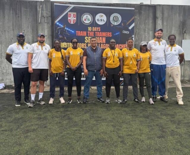 Aktobe Regional Football Association President Askhat Sagitzhanuly Kalzhanov (centre)