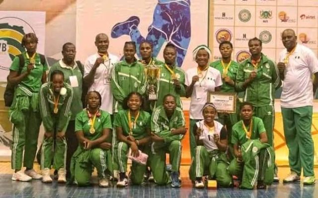 NVBF officials with volleyball team