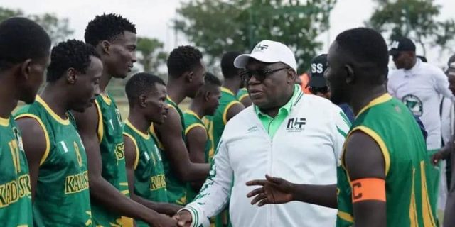Hockey Federation president, Simon Nkom (centre